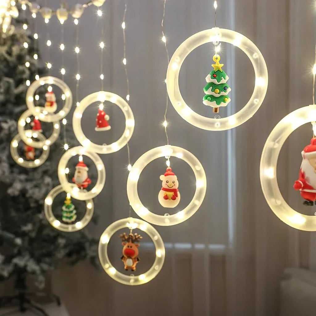 Cortina de Luzes LED com Figuras Natalinas – Argolas, Árvores, Corações e Estrelas